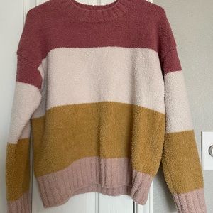 Pink white and yellow sweater